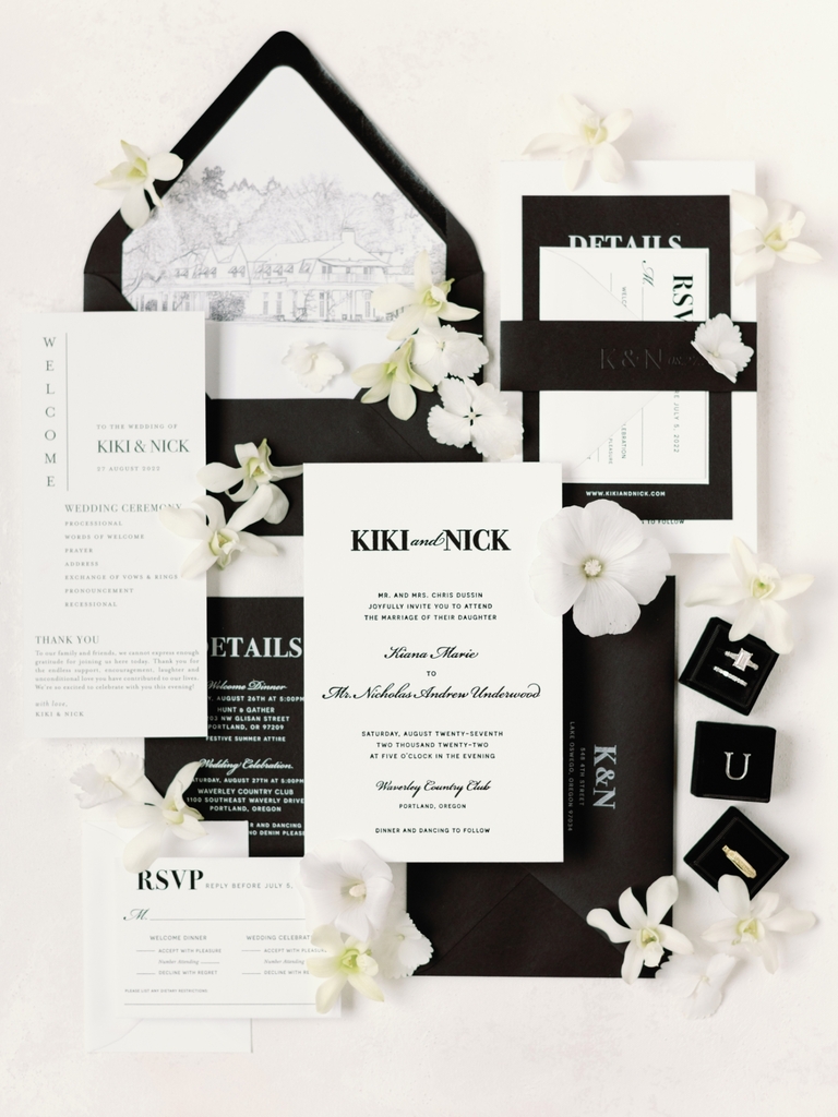 Black and white wedding invitation flat lay by Crave Design