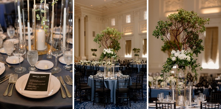 Navy blue satin linens with ivory flowers and taper candles at a wedding reception