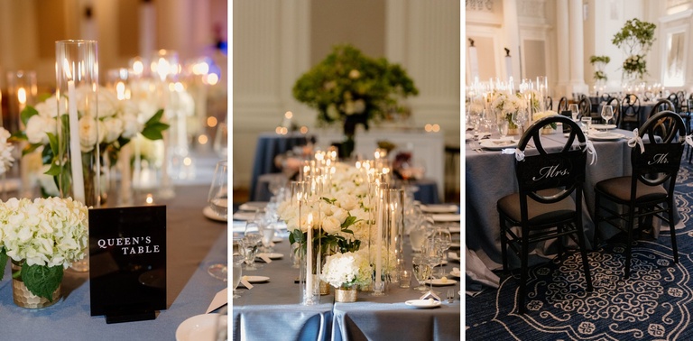 Navy blue satin linens with ivory flowers and taper candles at a wedding reception