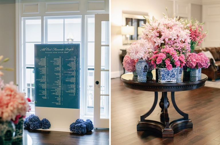 Entry table with pink flowers in Qinghua porcelain vases at a wedding reception