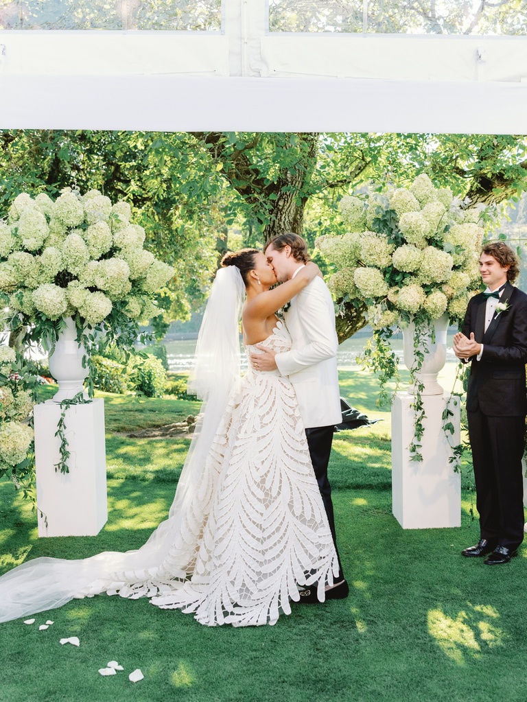 Outdoor wedding ceremony under a clear-top tent at Waverly Country Club