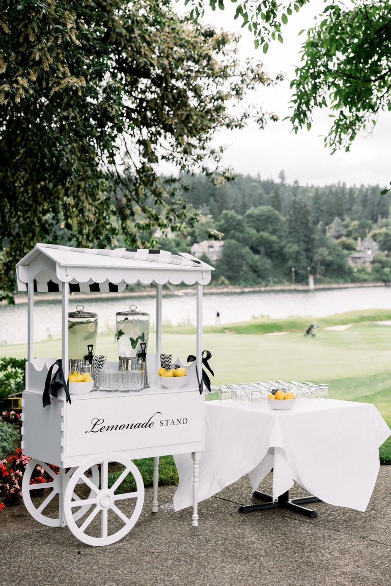 Vintage-inspired black and white lemonade stand at a Portland wedding